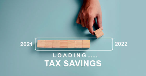 image of blocks along a thermometer ranging between 2021 and 2022 with the level closer to 2022. The text "loading... tax savings" is shown on the graphic.
