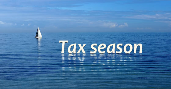 Image of a lake with the words "tax season" written along the horizon.