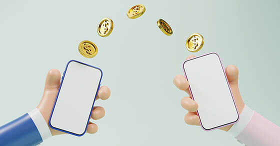 Hands holding smartphone with dollar coin flowing for money transfer and payment by internet banking service concept from realistic 3d render.