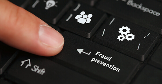 Image of a keyboard with the return key labeled as "Fraud Prevention"