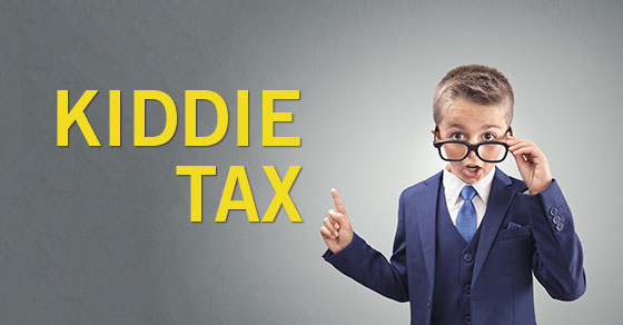 image of a child, dressed in business attire, with the words "kiddie tax" written