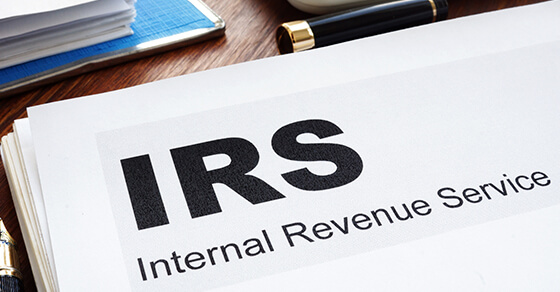 IRS Internal Revenue Service documents and folder.