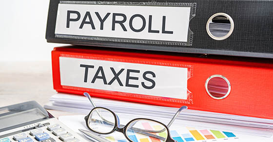 Payroll taxes. Binder data finance report business with graph analysis in office.