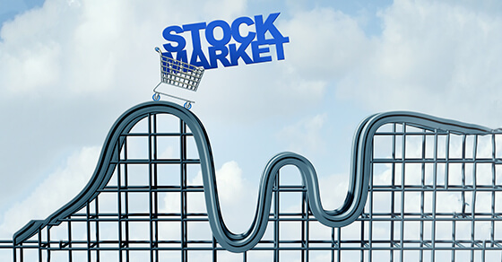 image of a roller coaster with the cart at the top labeled "stock market"