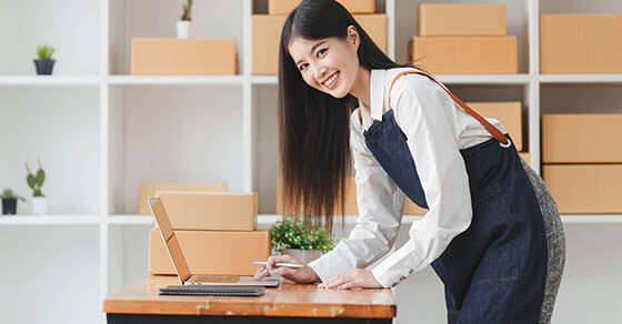 Small businesses SME owners female entrepreneurs check online orders to prepare to pack the boxes, sell to customers, sme business ideas online