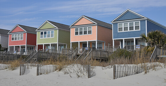 Image of homes on a beach.