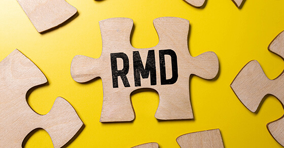 image of puzzle pieces and the text "RMD" on one of them.