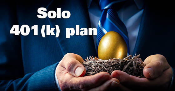 Hands Of Business Man Holding Golden Nest Egg - Investment Concept